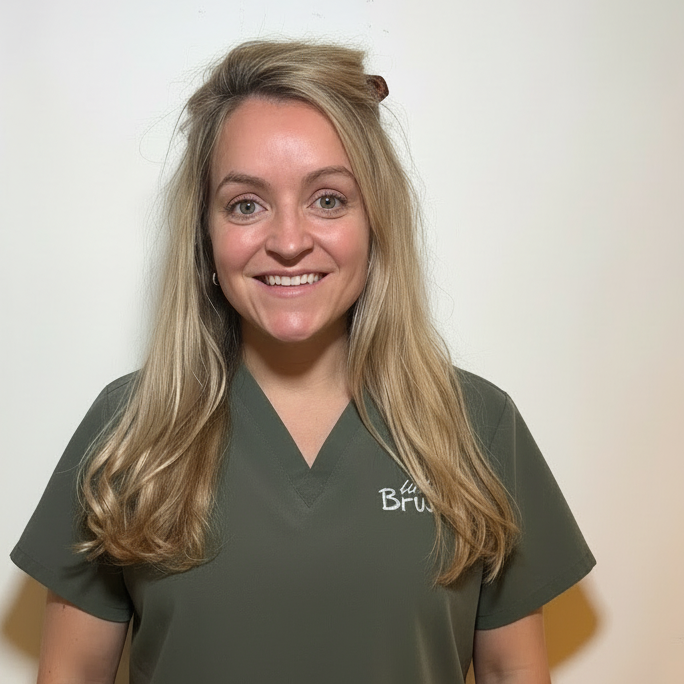 scrubs with a logo against a plain background