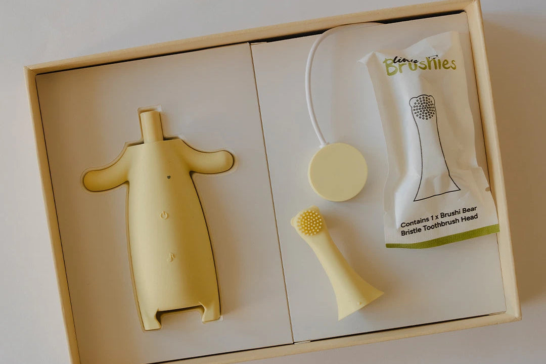 Brushi Bear electric toothbrush for children in a box on a light background